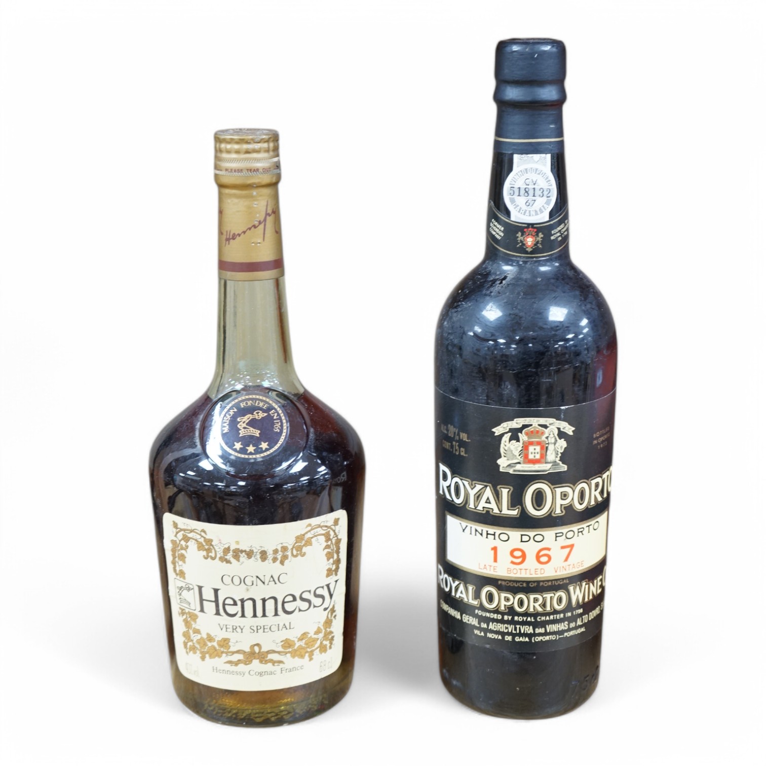 A bottle of Royal Oporto 1967 port together with a bottle of Hennessy Cognac (2). Condition - unknown storage